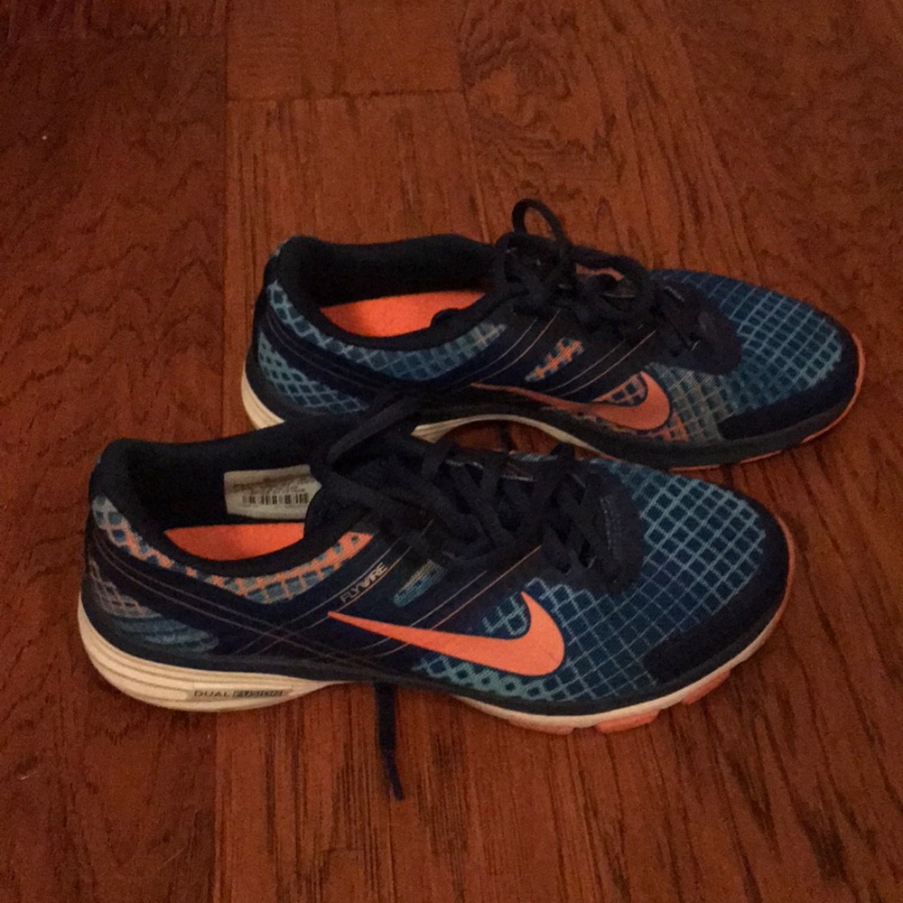 Blue and pink nike tennis shoes